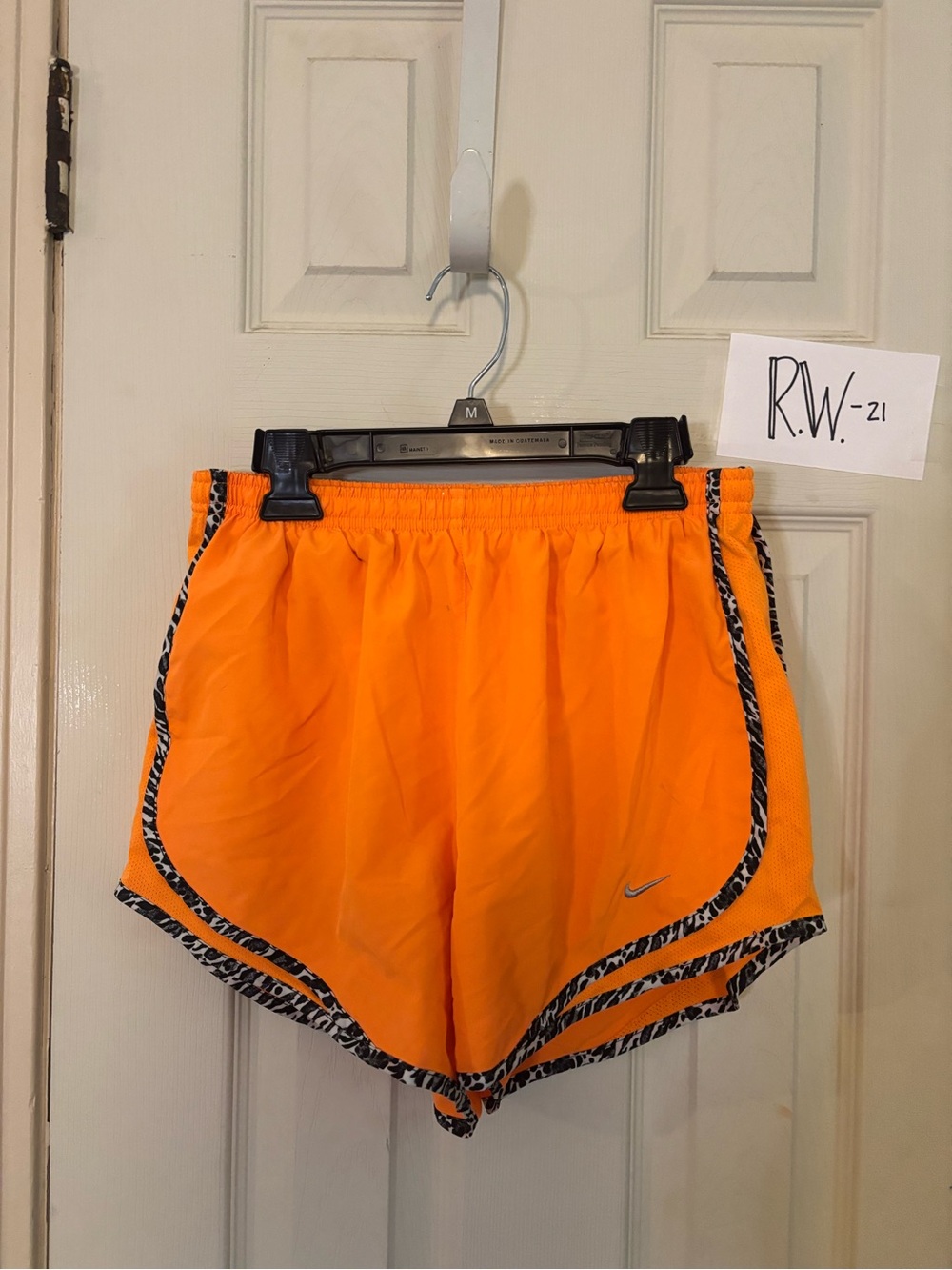 Nike Women's Bright Orange Athletic Shorts with Zebra-Print Trim